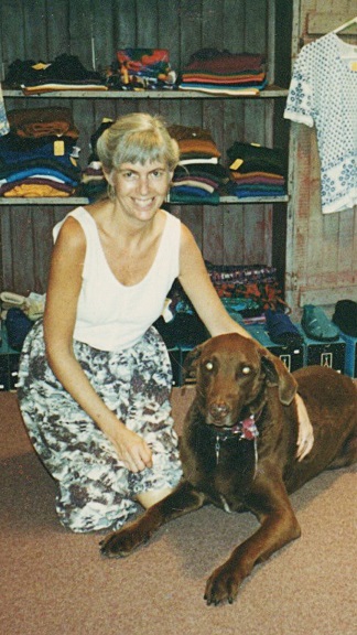 Sandra Shelton with pet, inside store